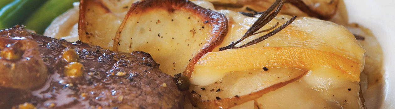 Layered Potato & Onion Bake with Oka Cheese