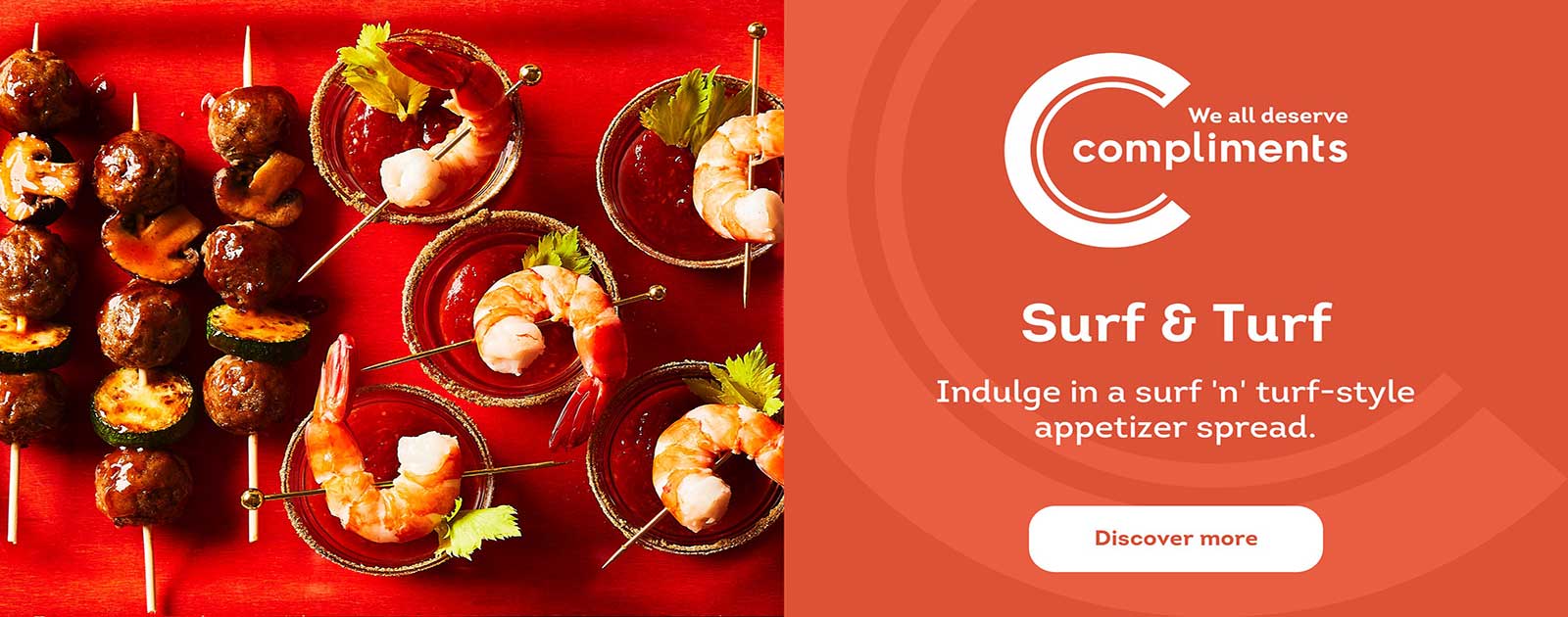 Text reading 'Surf and Turf. Indulge in a surf and turf-style appetizer spread' atop a 'Discover More' button a picture of a fancy shrimp appetizer.