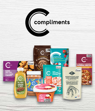 Assorted Compliments products arranged together, with Compliments logo.